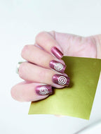 Máscara de vinil para nail art. espirais douradas